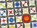 Carte di Jungle Speed con simboli colorati. Le regole del gioco sono semplici: trova le coppie di simboli identici per vincere.