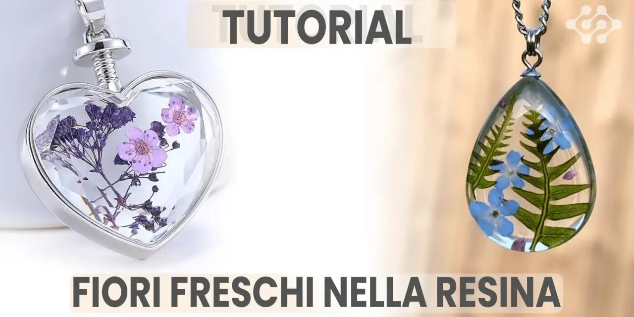 Ciondoli a forma di cuore e goccia con fiori freschi nella resina, perfetti per un tutorial creativo.