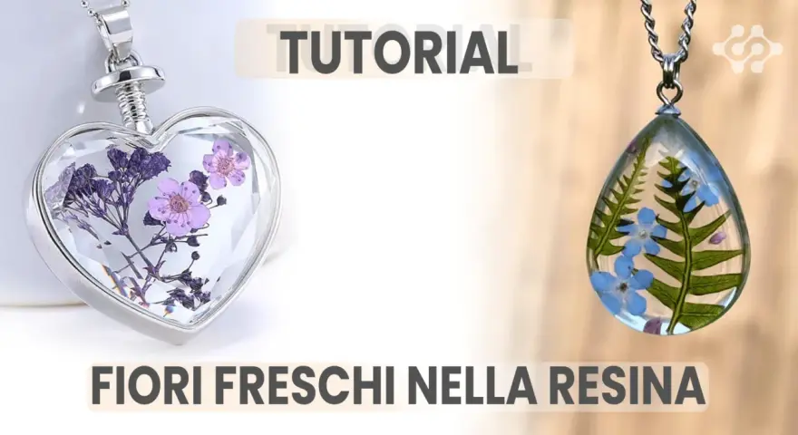 Ciondoli a forma di cuore e goccia con fiori freschi nella resina, perfetti per un tutorial creativo.