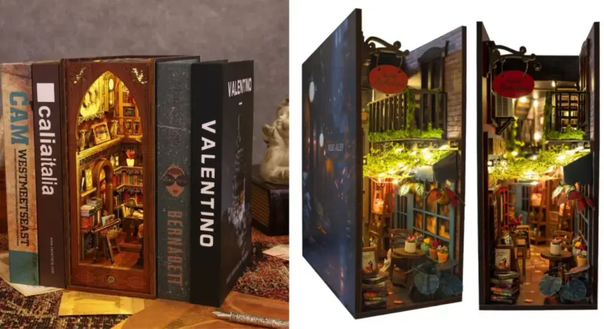 Un book nook cos'è? Un mondo in miniatura tra i libri: una libreria segreta e un vicolo illuminato.
